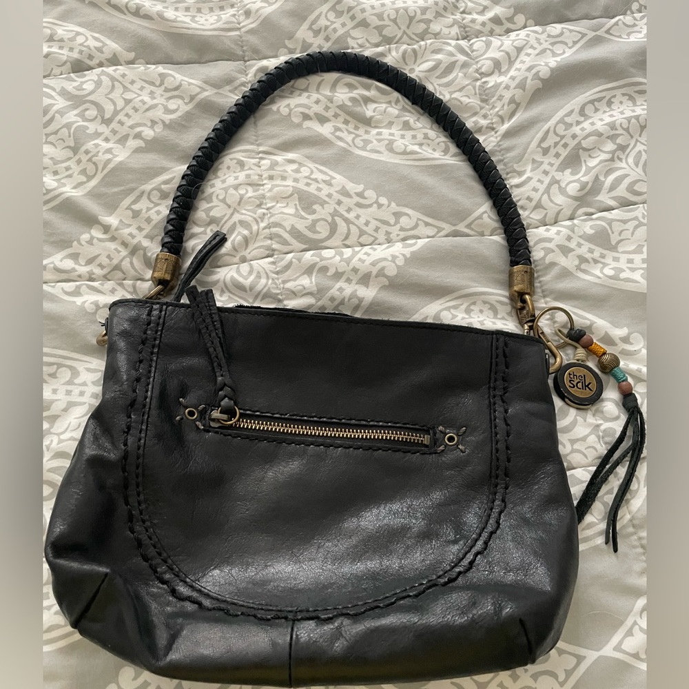 The Sak purse, black, very soft leather, very little wear and tear, looks great
